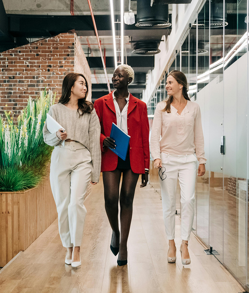 Partners of the InnerSpace program walking in workspace 